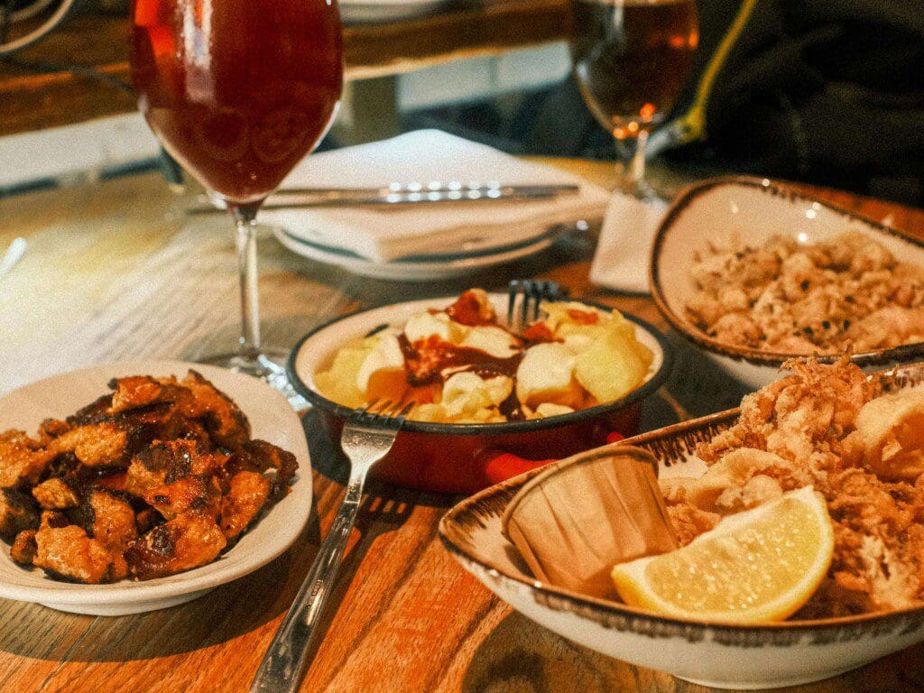 Featured image for blog post titled "Must-Try Tapas Barcelona Bars: Top 12 Picks"