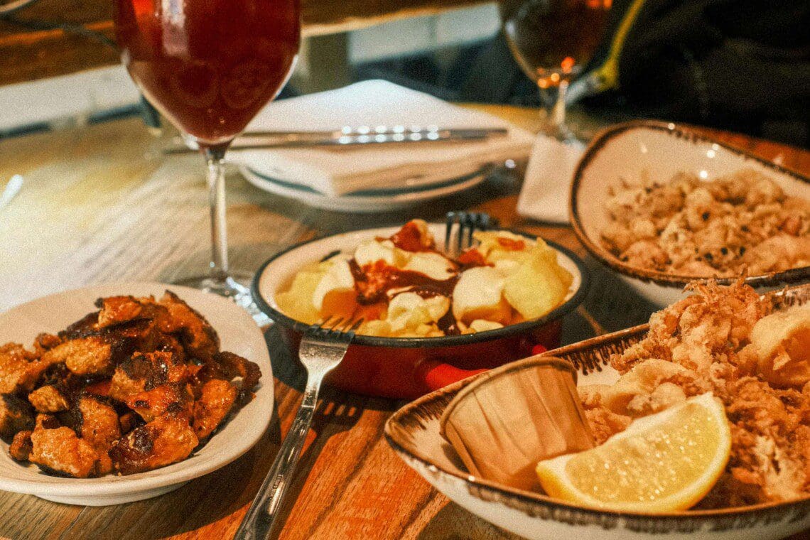 Featured image for blog post titled "Must-Try Tapas Barcelona Bars: Top 12 Picks"